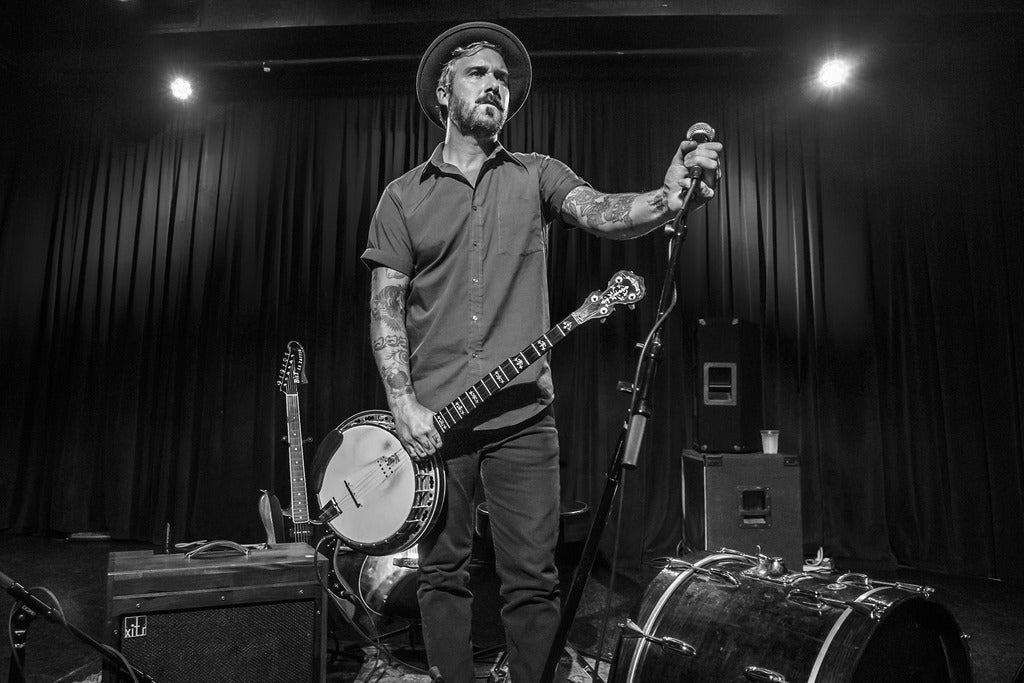 William Elloitt Whitmore w/ Benny Sidelinger (partially seated)